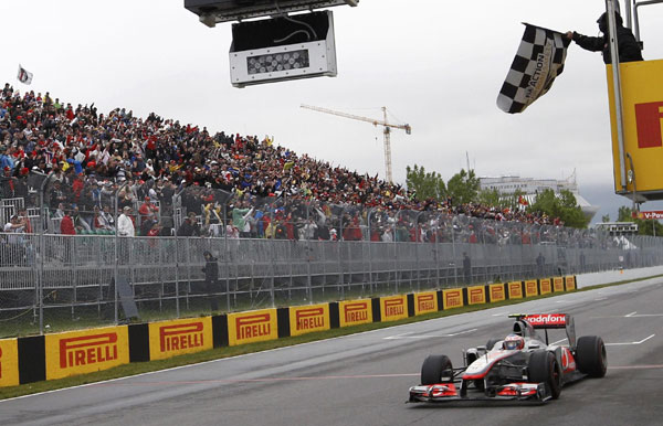 Button wins rain-delayed Canadian F1 Grand Prix