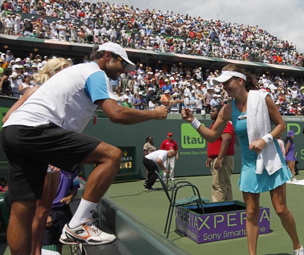 Radwanska beats Sharapova to win Miami title