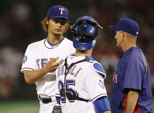 Darvish roughed up, but wins MLB debut