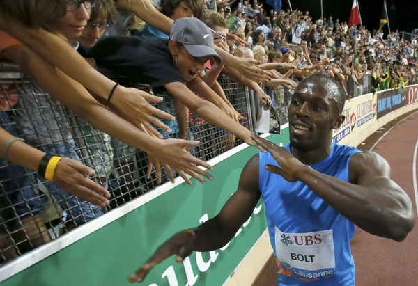 Bolt wins 200, Blake sets personal best