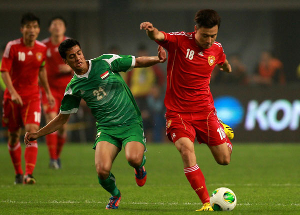 China leads Iraq 1-0 in 2015 Asian Cup qualifier