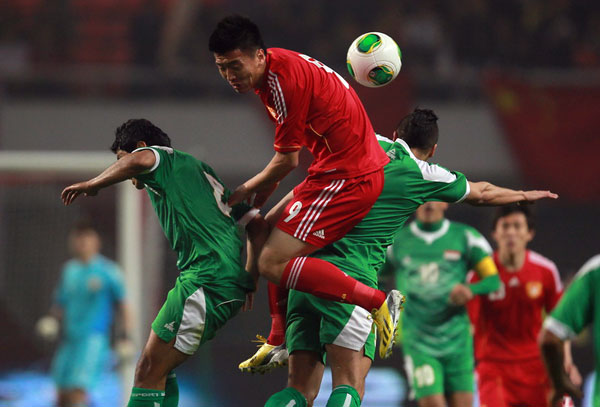 China leads Iraq 1-0 in 2015 Asian Cup qualifier