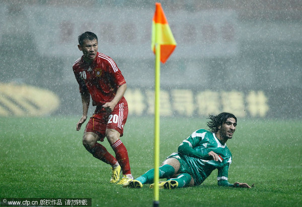 China leads Iraq 1-0 in 2015 Asian Cup qualifier