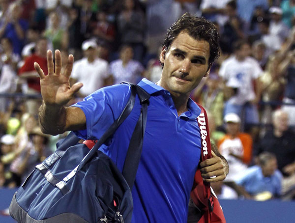 Federer knocked out of US Open by Robredo