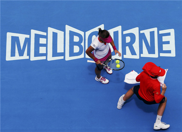 Li Na charges into last eight