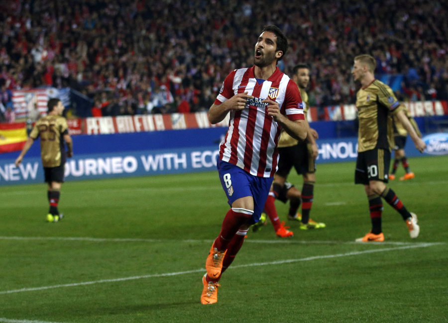 Atletico sinks AC Milan, Bayern ousts Arsenal