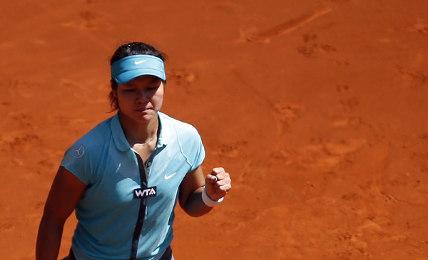 Li Na beats Zheng Jie to advance in Madrid Open