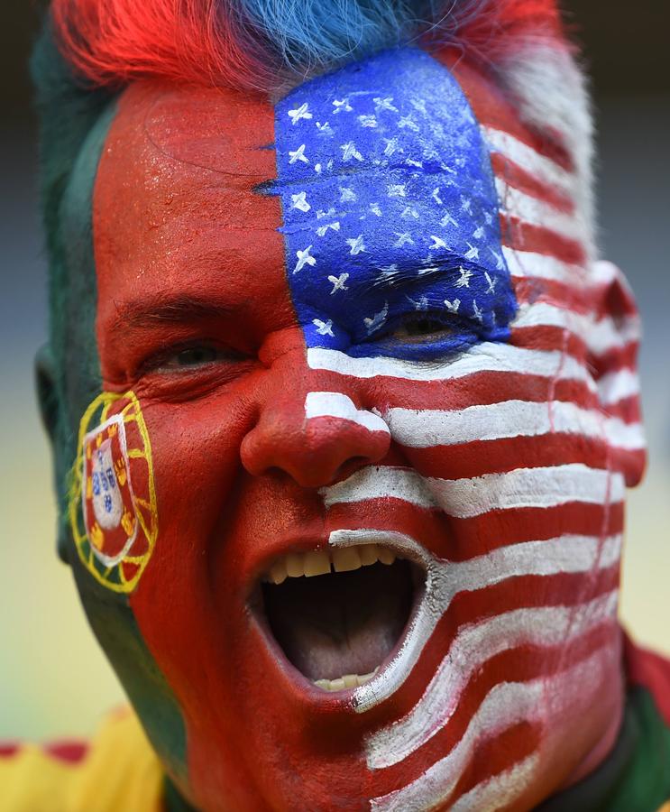 National flags on fan's face