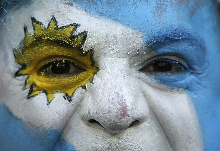 National flags on fan's face