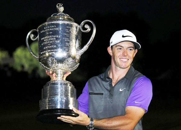 McIlroy wins PGA in thrilling show on soggy turf