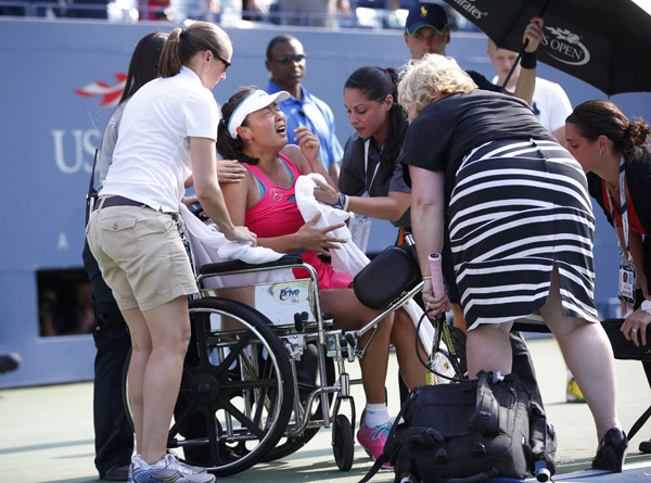 Wozniacki reaches US open final as injured Peng quits