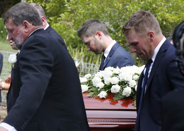 Australia bids farewell to Hughes in hometown funeral