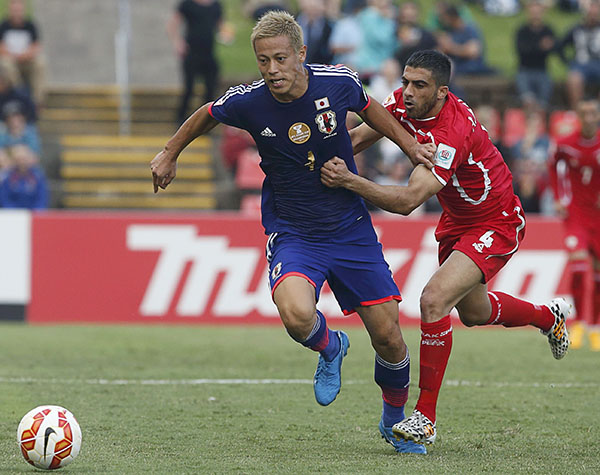 Japan eases to routine win in their Asian Cup opener