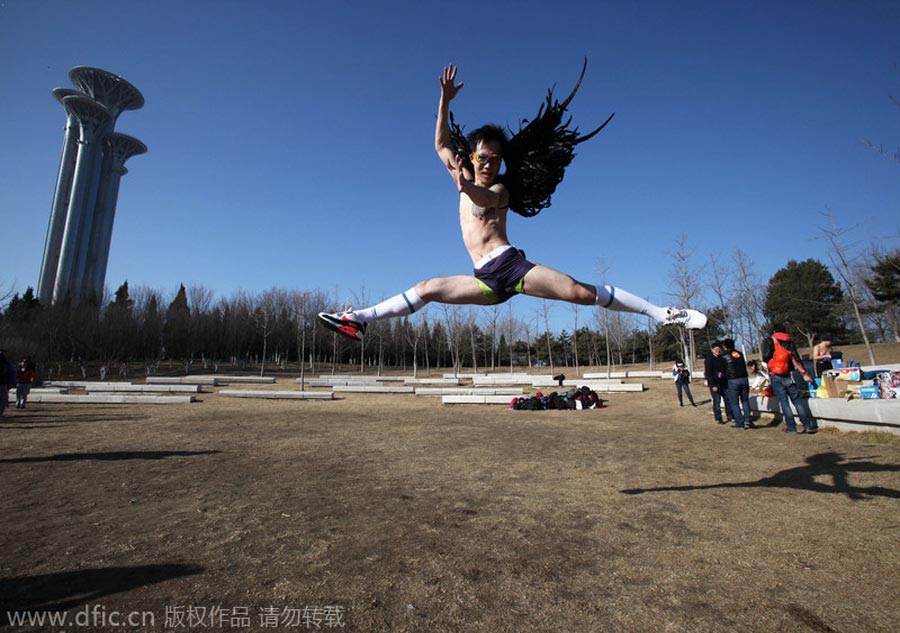 Monkey king, angel and superwoman at Beijing's 'naked run' race