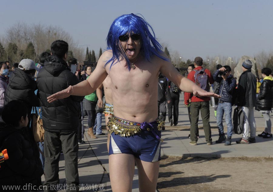 Monkey king, angel and superwoman at Beijing's 'naked run' race