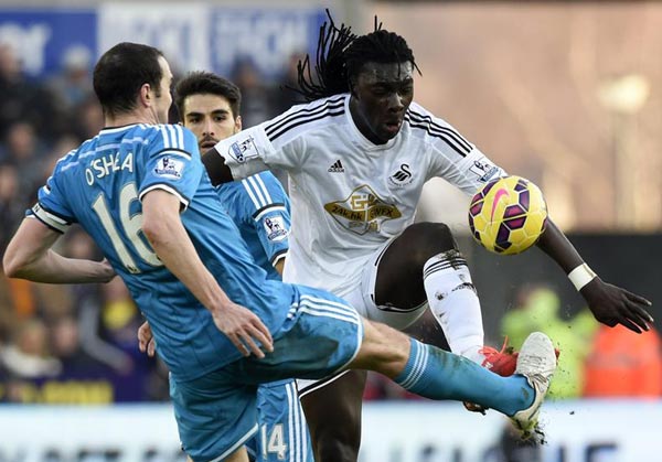 Swansea striker Gomis collapses during Premier League match