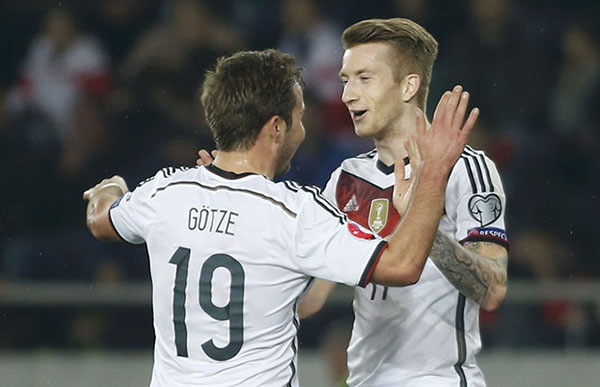 Reus, Mueller on target as Germany eases past Georgia