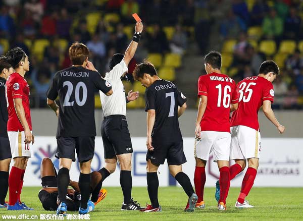 Late penalty stuns Guangzhou Evergrande