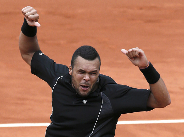 Tsonga upsets Berdych to light up Roland Garros