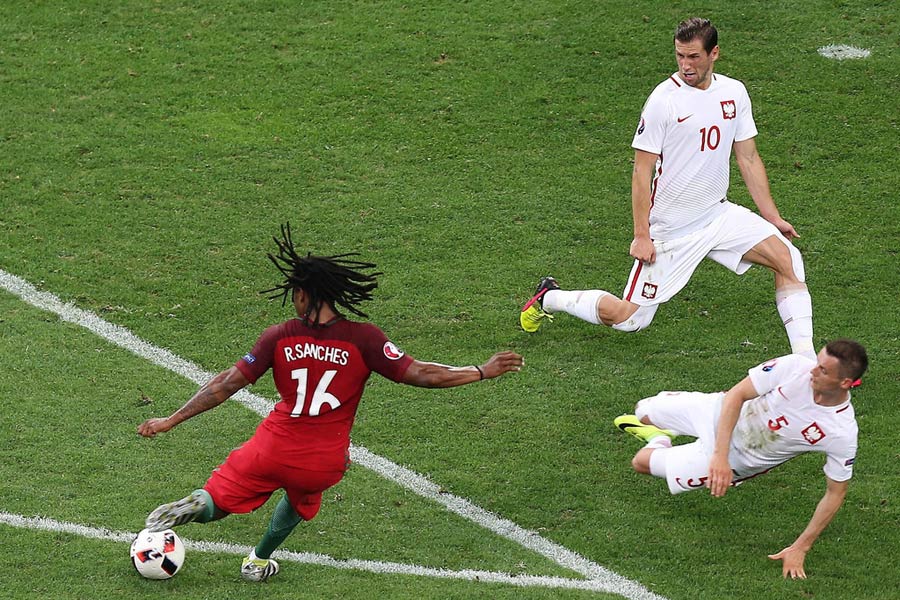 Portugal beat Poland in shootout to reach semis