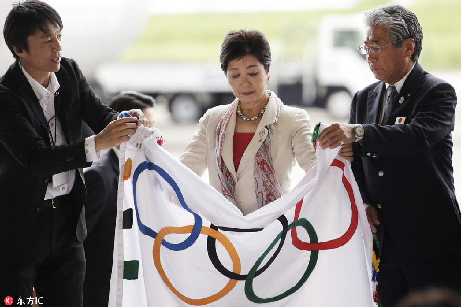 Tokyo welcomes the Olympic flag