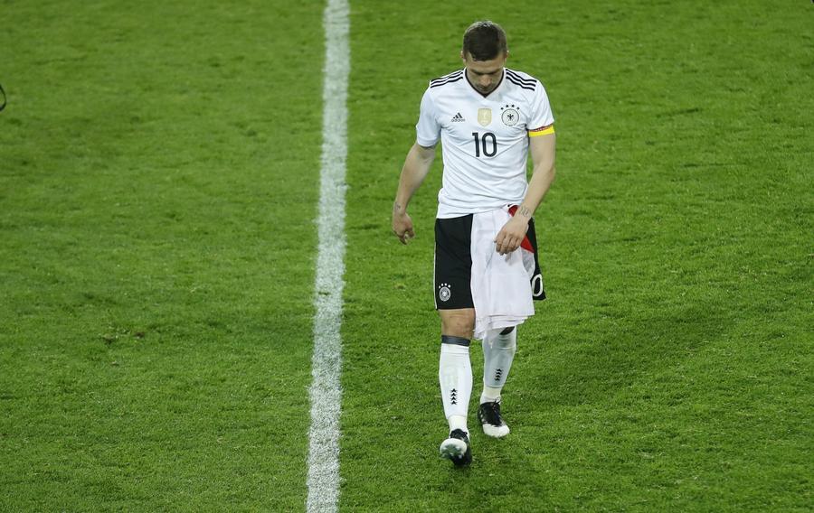 Podolski gets perfect send-off with winning goal for Germany