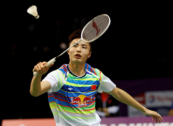 China's Super Dan and Shi reach second round at badminton worlds