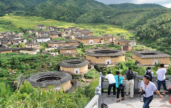 Tourists visit Tulous in Yongding, China's Fujian