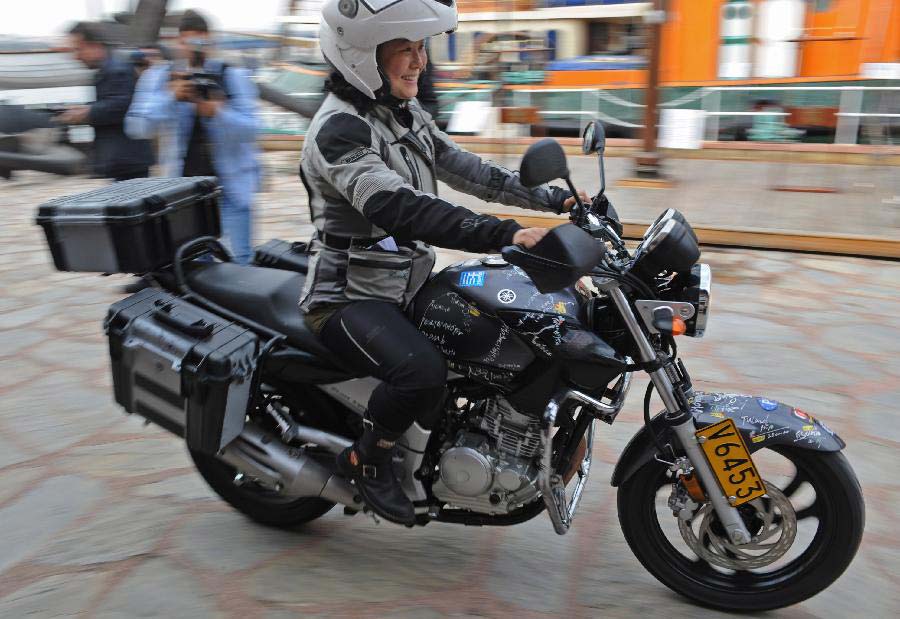 Chinese girl travels across Eurasia by motorcycle