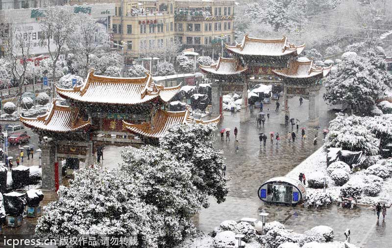 Yunnan cities hit with snow