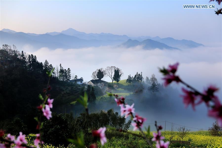 Clouds shroud ancient village Shitan, Anhui