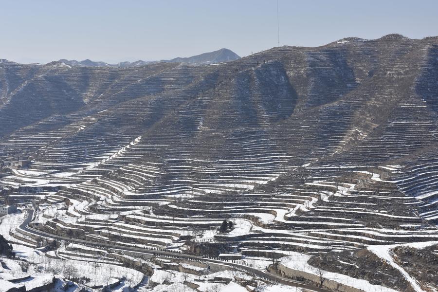 Scenery of terraced fields after snow in Hebei