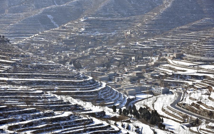 Scenery of terraced fields after snow in Hebei