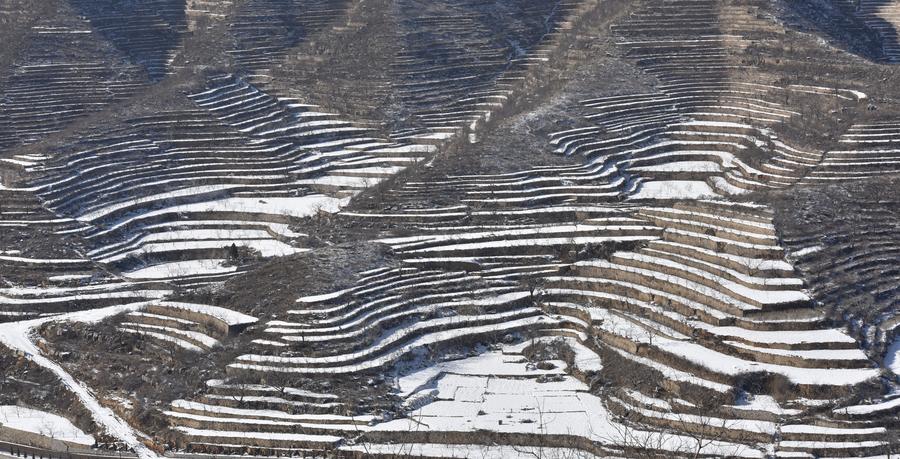 Scenery of terraced fields after snow in Hebei