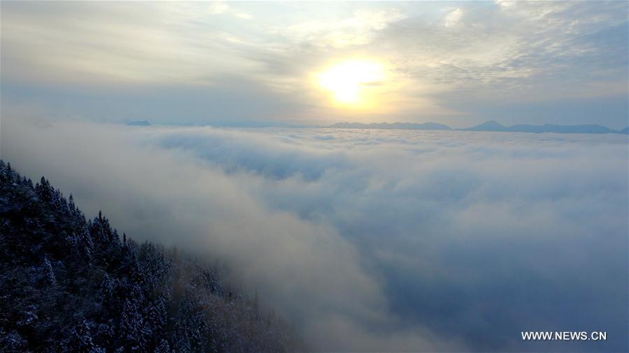 Sea of clouds seen over snow-covered mountains in Hubei