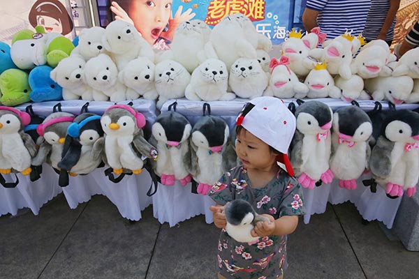 Tourism photo show looking into NE China opens in Beijing