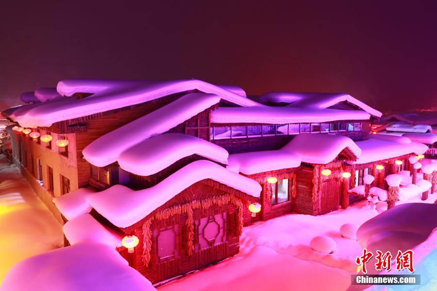 A nighttime winter wonderland in China's snow town