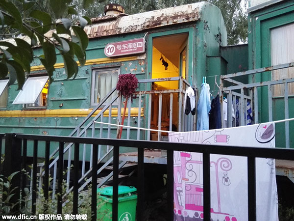 Students sleep in retired train