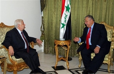 In this photo released by the Iraq President Press Office Iraqi President Jalal Talabani, right, meets with Syria's Foreign Minister Walid Moallem in Baghdad, Iraq, Monday, Nov. 20, 2006. Talabani met privately with Walid Moallem during the second and final day of the foreign minister's visit to Iraq. (AP