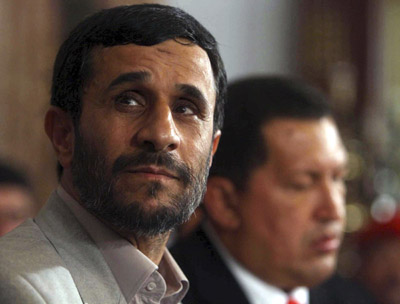 Venezuela's President Hugo Chavez (R) and his Iranian counterpart Mahmoud Ahmadinejad meet at Miraflores Palace in Caracas January 13, 2007. 