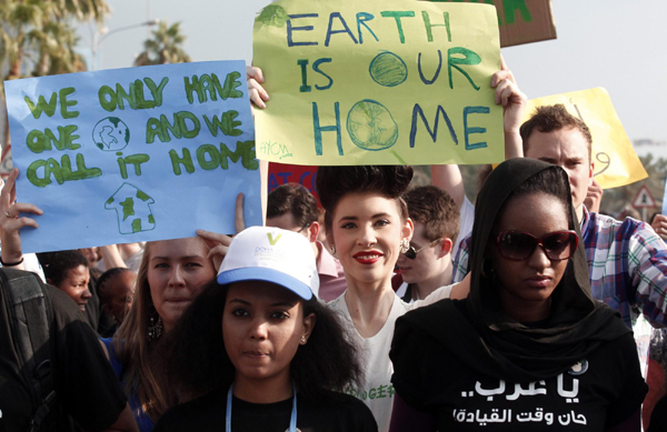 Activists march to demand action on climate change