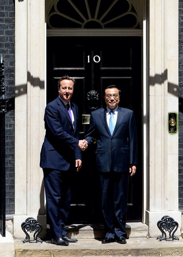 Premier Li meets British Queen, Prime Minister