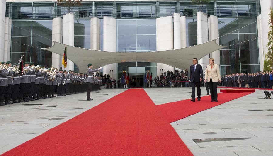 Chinese premier attends welcoming ceremony held by Merkel