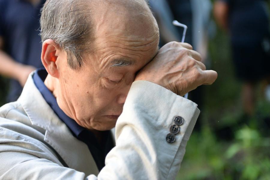 Japanese war orphan mourns adoptive parents in NE China