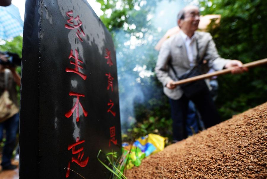 Japanese war orphan mourns adoptive parents in NE China