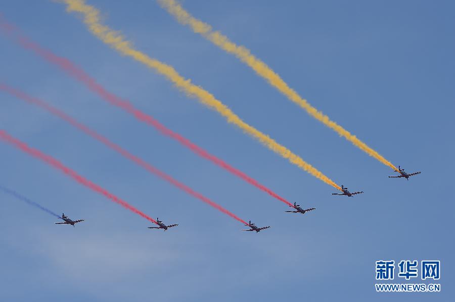 Military aircraft dazzle spectators with stunts