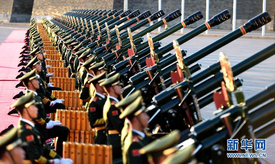 Military band performance, gun salute and flag raising