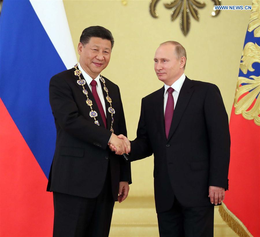 China, Russia pledge to play role of ballast stone for world peace