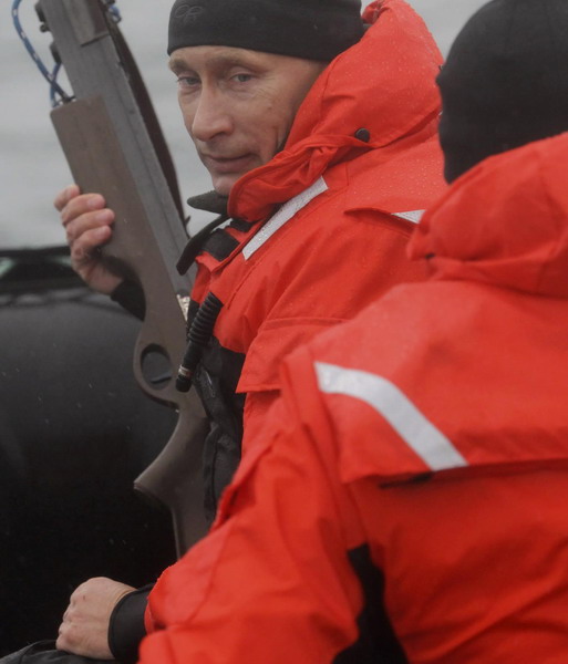 Russia's Putin braves rough seas to study whales