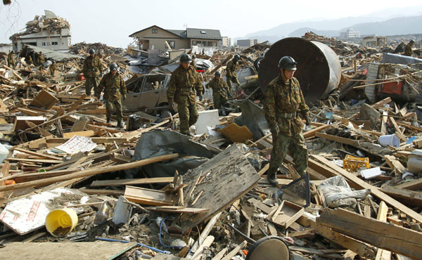 Troops doubled for relief efforts, world rushes aid